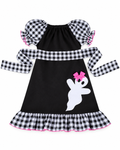 A toddler girl's Halloween dress featuring a black body, black and white gingham patterned sleeves and collar trim, a white ghost applique with a pink bow, and a gingham ruffled hem with pink trim.