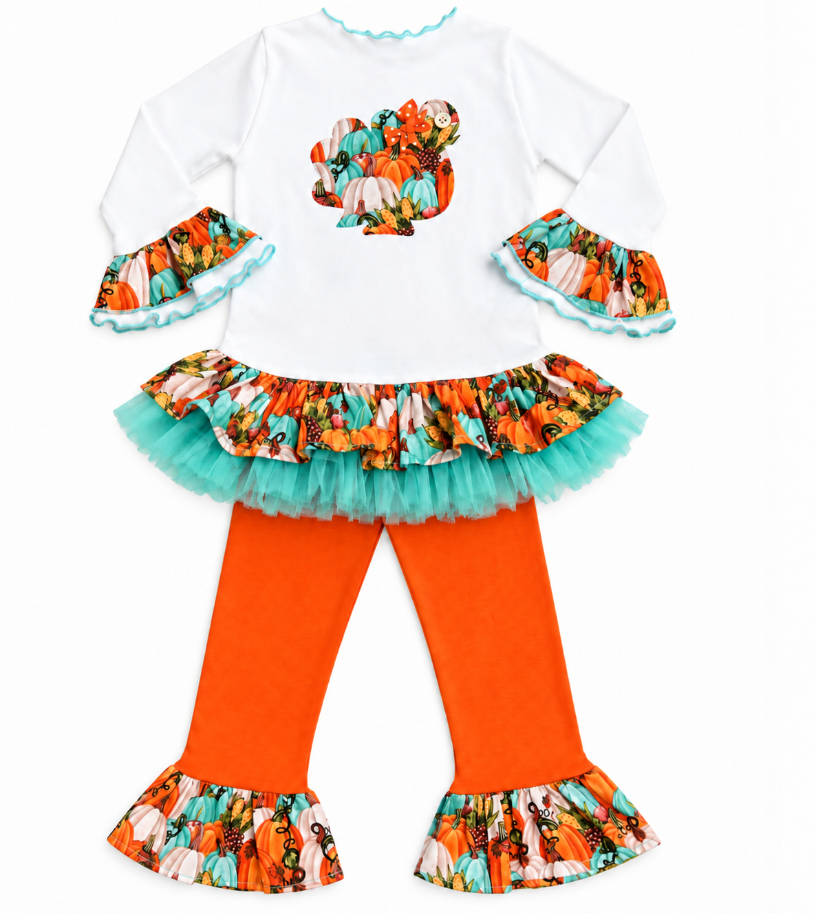 A children's two-piece outfit set featuring a white long-sleeve top with a colorful pumpkin patch graphic on the chest, a matching ruffled tutu skirt, and bright orange leggings with patterned ruffled cuffs and hem.
